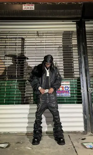 Jackboy wearing Balenciaga boots