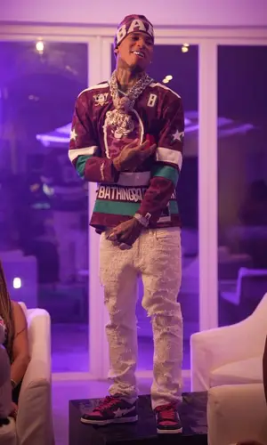 NLE Choppa wearing Bape jersey