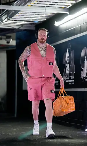 Maxx Crosby wearing Goyard bag