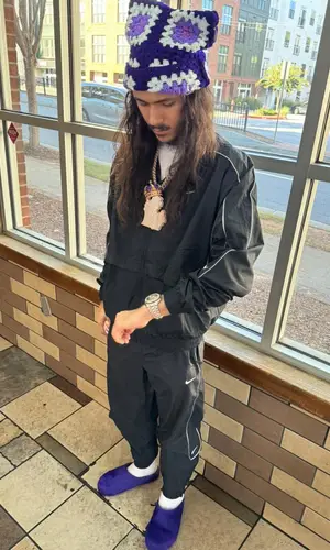 BabyTron wearing Nike pants