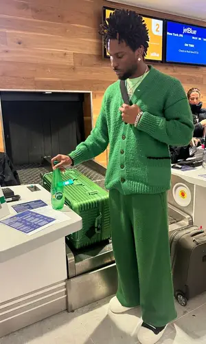 Saint JHN’s Outfit in Maison Margiela Sweater, Marni Pants & Rimowa Bag (2024)