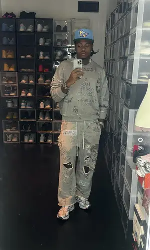 Gunna wearing Paly sweatshirt