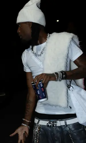Playboi Carti’s Outfit in Ralph Lauren T-Shirt, Louis Vuitton Hat & Chrome Hearts (2024)