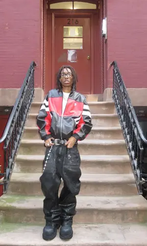 Lil Tecca wearing Alexander McQueen scarf