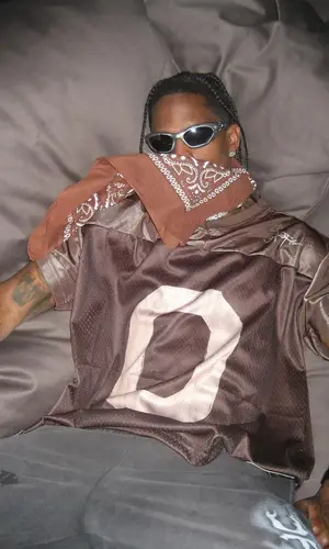 Travis Scott wearing Oakley eyewear