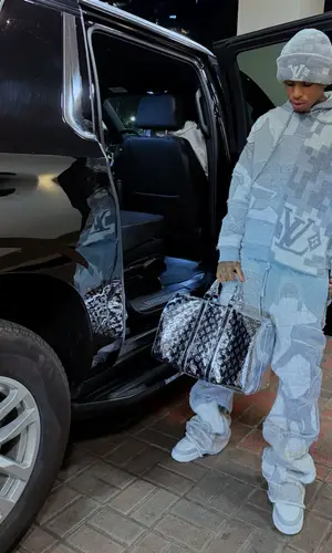 NLE Choppa wearing Louis Vuitton hat