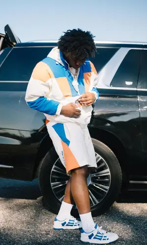 Fredo Bang’s Outfit in Kith Jacket, Amiri Sneakers & New York Knicks (2024)