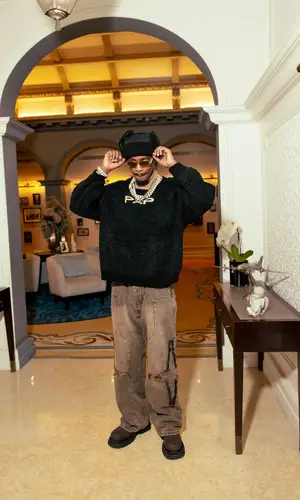 Lil Tjay wearing Bottega Veneta boots