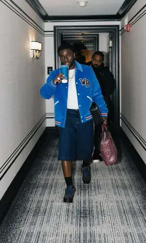 Lil Dann’s Outfit in Wales Bonner Jacket, Goyard Bag & Louis Vuitton (2024)