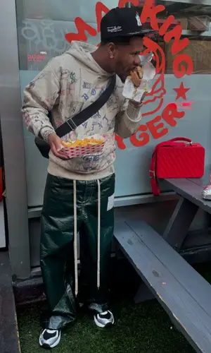 Devin Haney’s Outfit in BornxRaised Hoodie, Asics Sneakers & Saint Michael (2024)