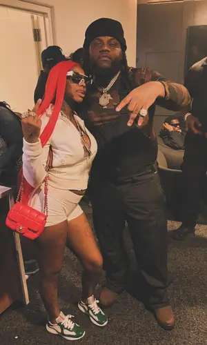 Sexyy Red wearing Chanel bag