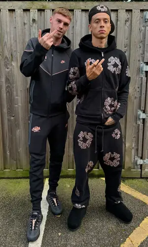 Cole Palmer wearing Nike pants