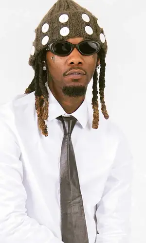 Offset wearing Bottega Veneta suit