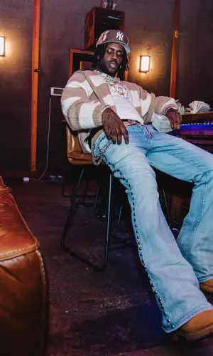 Chief Keef’s Outfit in Timberland Boots, Louis Vuitton Belt & Jon Stan Cap (2024)