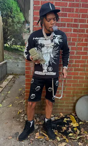 Lil Migo wearing Hellstar sweatshirt
