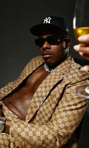 DaBaby’s Outfit in Gucci Jacket, Prada Eyewear & New Era Cap (2024)