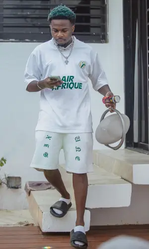 Didi B wearing Nike jersey