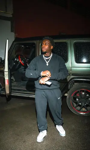Didi B wearing Nike pants