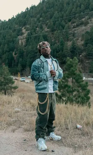 Jacquees’ Outfit in Nike Sneakers, Cartier Eyewear & Louis Vuitton Hat (2024)
