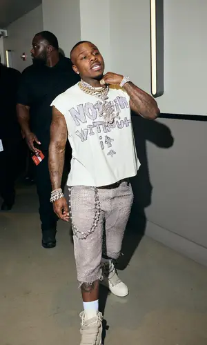 DaBaby’s Outfit in Vertabrae T-Shirt, Rick Owens Sneakers & Prada Eyewear (2024)