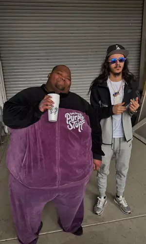 Dave Blunts wearing Dave Blunts Merch pants