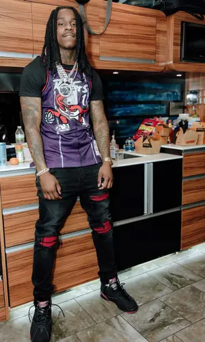 Polo G’s Outfit in Mitchell & Ness Jersey, Amiri Jeans & Jordan Sneakers (2024)