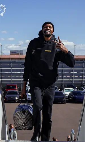 Kevin Durant’s Outfit in Vetements Hoodie, Goyard Bag & Crocs Sandals (2024)