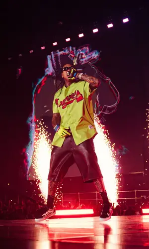 Tyga’s Outfit in Vintage Jersey, Chrome Hearts Eyewear & Fox Racing Gloves (2024)