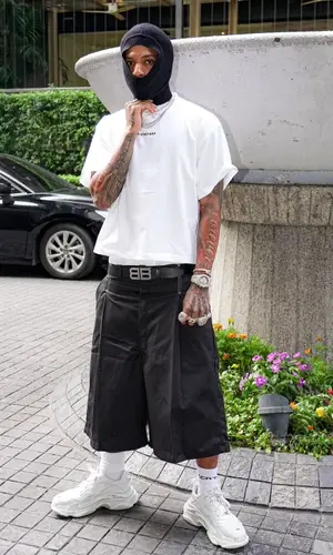 NLE Choppa wearing Balenciaga belt
