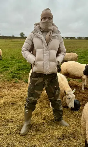 Central Cee wearing Chanel boots