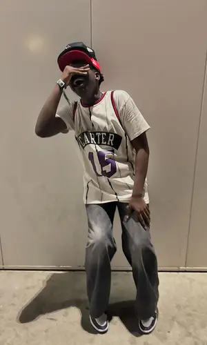 Dabo wearing Levi’s jeans