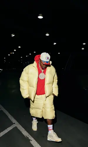 DaBaby’s Outfit in Jil Sander Jacket, Jordan Sneakers & Nike Socks (2024)