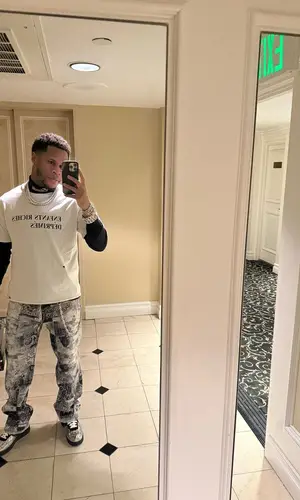 Devin Haney’s Outfit in Enfants Riches Deprimes T-Shirt, Louis Vuitton Sneakers & Nike (2024)