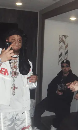 Trippie Redd’s Outfit in Eminent Jacket, Adidas Sneakers & AB Jewelers Jewelry (2024)