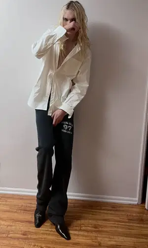 2hollis wearing Greg Ross pants
