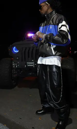 Playboi Carti wearing Playboi Carti Merch cap
