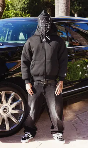 NLE Choppa wearing Carne Bollente sock