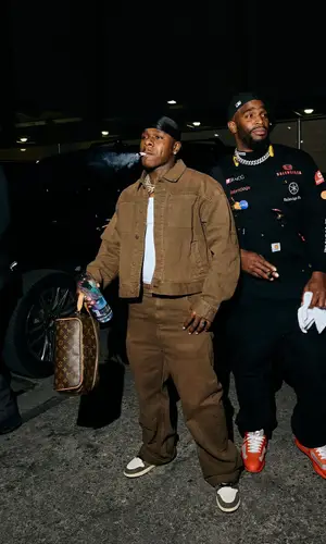 DaBaby’s Outfit in Nike Sneakers, Loverboy by Charles Jeffrey Hat & Travis Scott Merch (2025)
