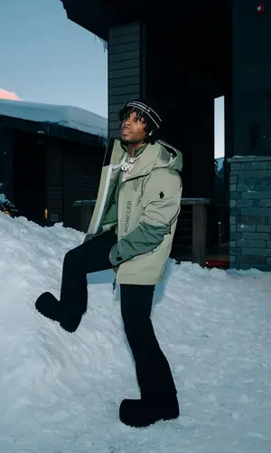 Toosii wearing Moncler jacket