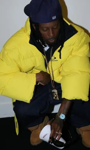 Playboi Carti wearing Rolex watch