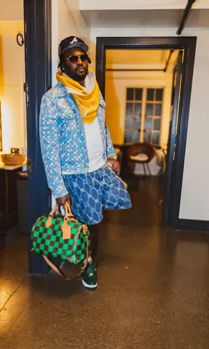 Peezy wearing Louis Vuitton scarf