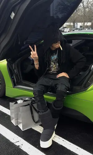 che wearing Rick Owens jeans