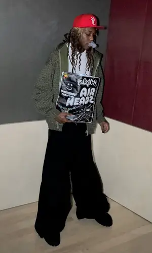Destroy Lonely wearing Playboi Carti Merch cap