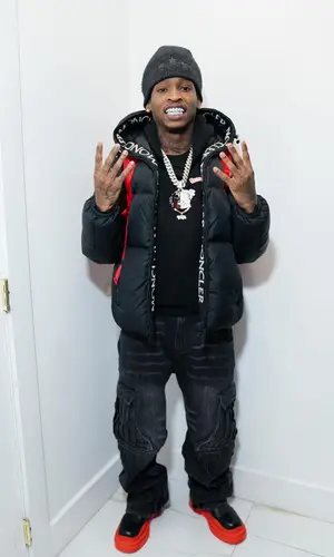 TaTa wearing Moncler jacket