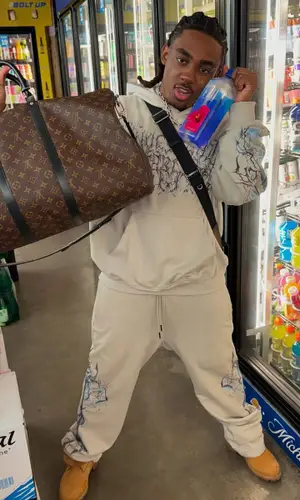 Eem Triplin wearing Copes pants