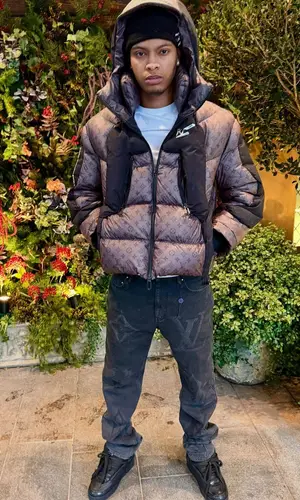Nemzzz wearing Louis Vuitton jacket