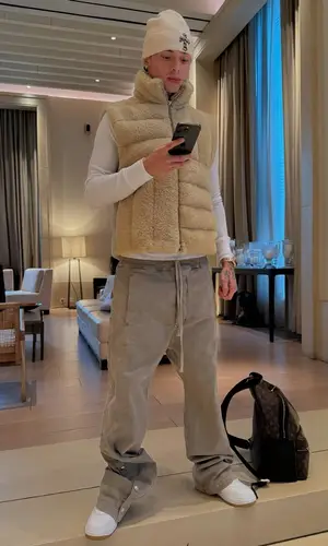 Central Cee wearing Louis Vuitton backpack