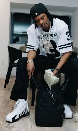 Lil Baby wearing Willy Chavarria jersey