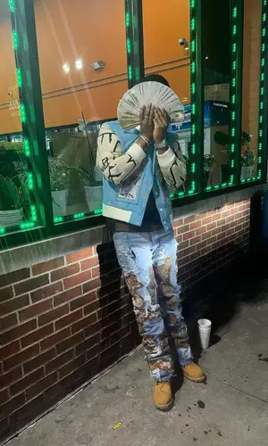 Baby Money’s Outfit in Who Decides War Jacket, Louis Vuitton T-Shirt & Timberland Boots (2025)