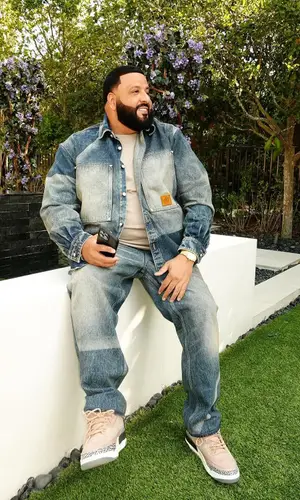 DJ Khaled wearing Louis Vuitton jeans